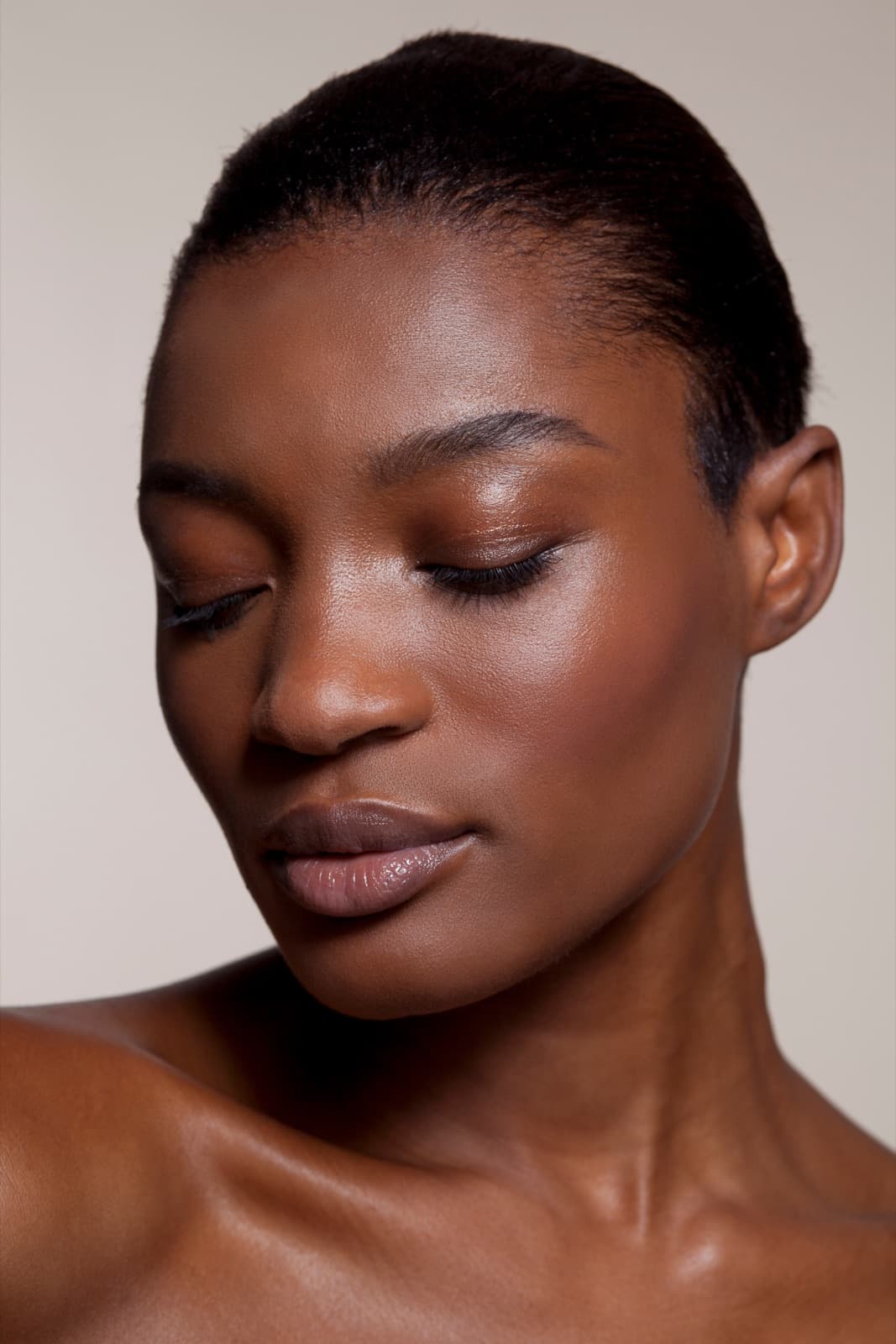 A serene portrait, eyes closed, in soft morning light